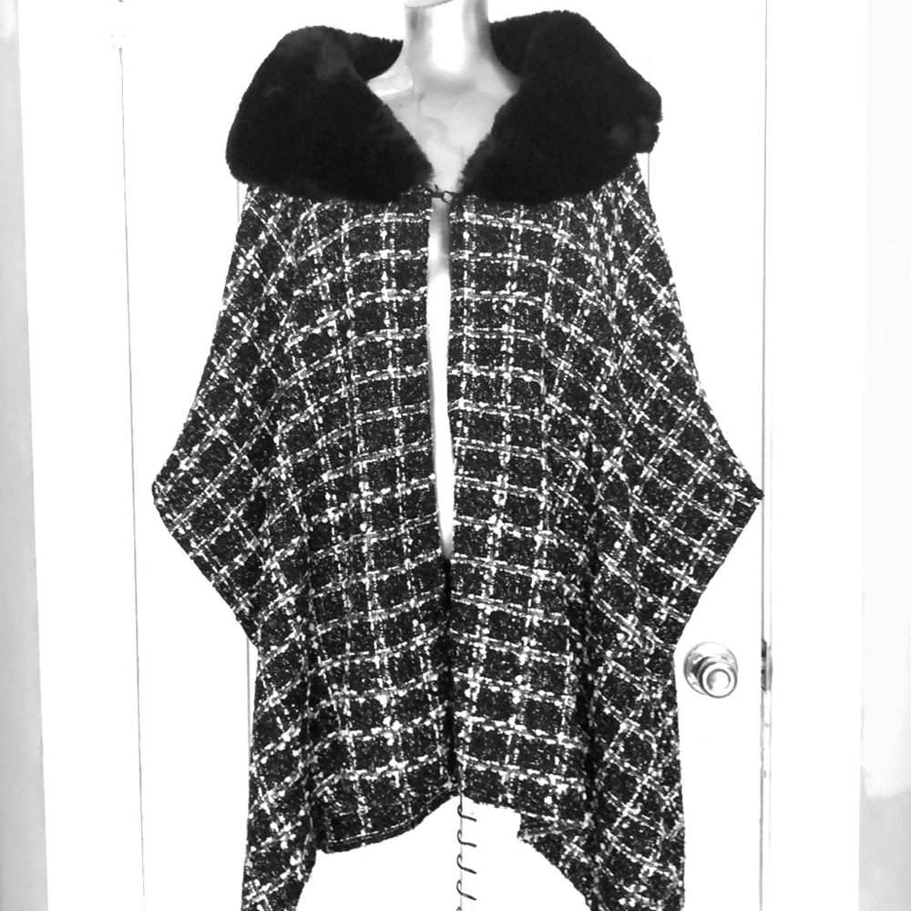 Wrap with faux fur collar. Arms slip in. Top snap